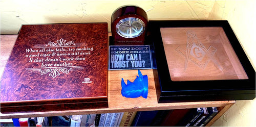 Twenty stick humidors.  Burl wood top and Ebony glass top finish.